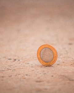 silver and gold round coin