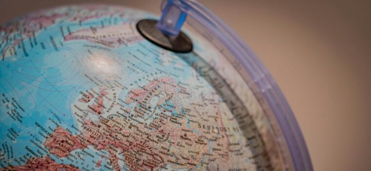 blue and white globe with blue plastic frame